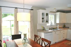 Interior of a kitchen with a balcony door