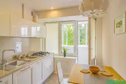 Interior of a kitchen with a balcony door