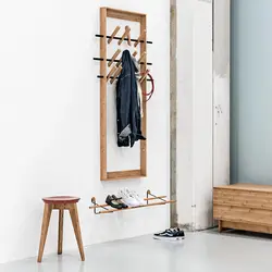 Photo of hangers in the hallway in a modern style