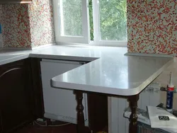 Countertop Together With A Window Sill In The Kitchen Photo