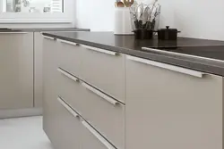 Modern kitchen handles in a modern style photo