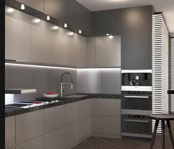 White-gray corner kitchen in the interior