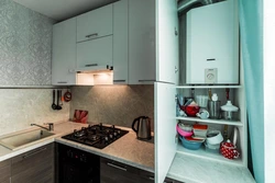 Kitchen with a heater and a refrigerator in Khrushchev real photos