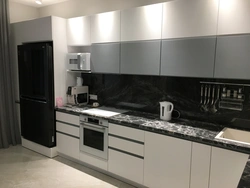 Black and white corner kitchen design