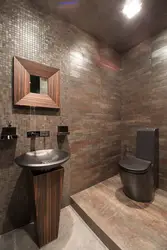 Bathroom design with black toilet