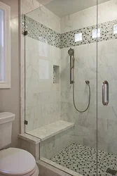 Shower In A Bathroom Without A Cubicle Made Of Tiles Photo
