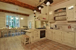 Kitchen design in a modern style in a wooden house