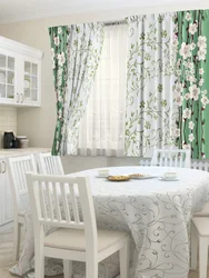 Light green curtains in the kitchen interior