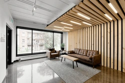 Slatted panels in the living room interior photo