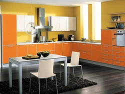 Orange kitchen in the interior photo with what kind of wallpaper and curtains