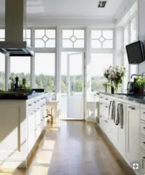 Kitchen with panoramic window in apartment photo design