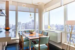 Kitchen with panoramic window in apartment photo design