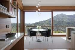Кухня с панорамным окном в квартире фото дизайн