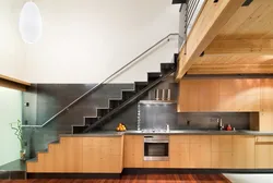 Kitchen combined with stairs photo