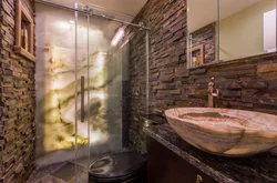 Bathtub with artificial stone photo