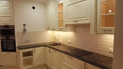 Apron and countertop for a beige kitchen photo