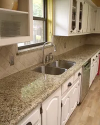 Apron And Countertop For A Beige Kitchen Photo