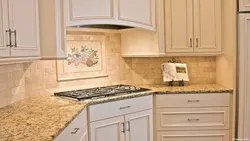 Apron and countertop for a beige kitchen photo