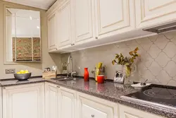 Apron and countertop for a beige kitchen photo