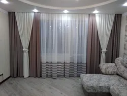 Dark curtains in the living room interior