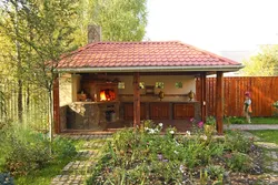 Summer kitchen for a country house photo