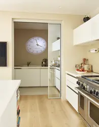 Large clock in the kitchen interior