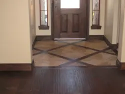 Floor design in the hallway in the apartment photo