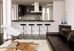 Kitchen design with bar counter, table and sofa