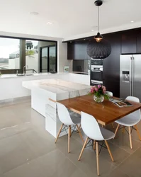 Island in the kitchen as a dining table photo