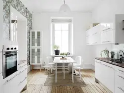 Combination of white kitchen with wallpaper photo