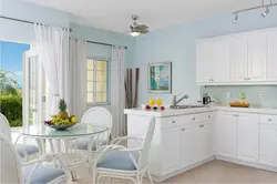 Combination of white kitchen with wallpaper photo