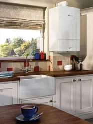 Photo of a kitchen in a house with a boiler on the wall