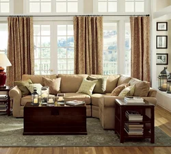 Photo of curtains in the living room with brown furniture