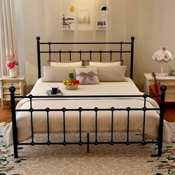 Wrought iron bed in the bedroom photo