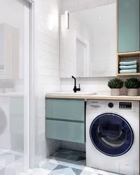 Photo of a bathtub machine under the sink