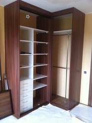 Corner wardrobe in the bedroom contents with dimensions photo