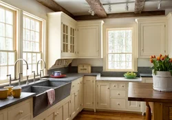 Kitchen design in a country house with a large window