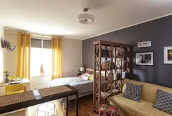 Living room and sleeping area in a one-room apartment photo