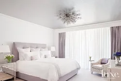 Photo of suspended ceilings in a white bedroom