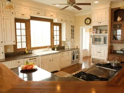 Kitchen design in a country house with a window