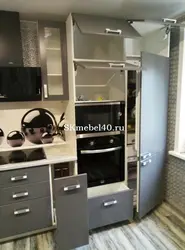 Pencil case in the kitchen with built-in appliances photo