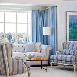 Blue curtains in the living room interior