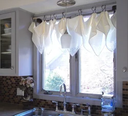 Curtains for the kitchen in the Roman style, short to the window sill photo