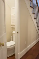 Bathroom under stairs design