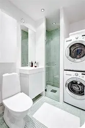 Small Bathroom With Shower And Washing Machine Photo