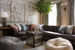 Brown color of the sofa in the living room interior