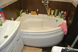 Asymmetrical Bathtub In The Bathroom Interior