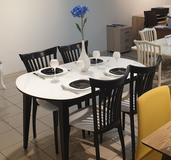 White chairs and table in the kitchen interior