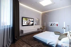 Спальня кровать телевизор дизайн фото