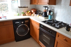 Photo of kitchen with washing machine